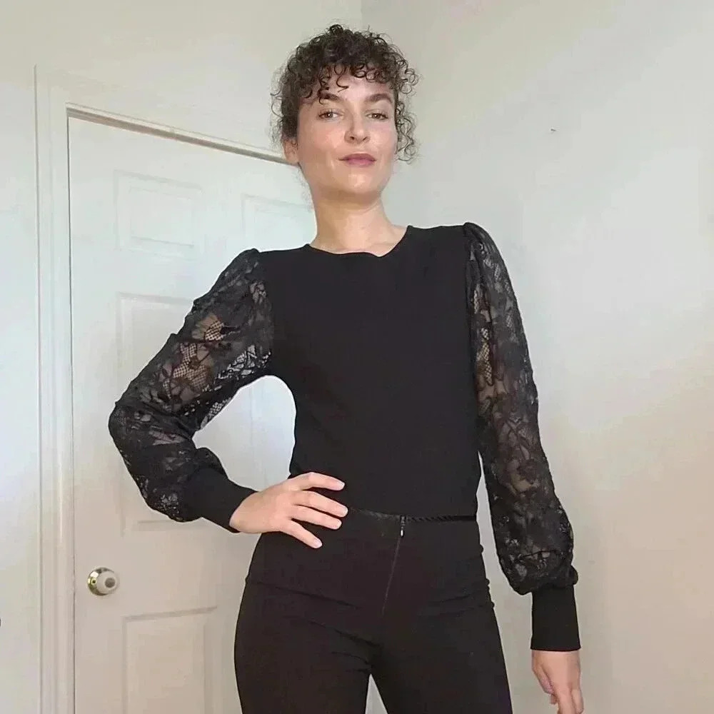 Black long-sleeve bodysuit by Revamped